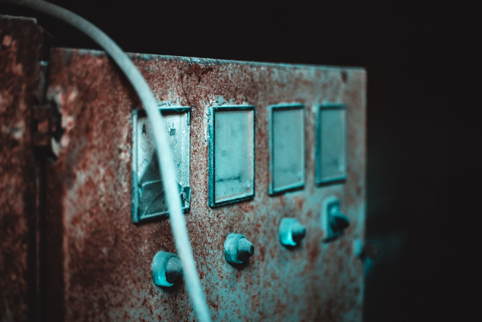 Rusty, obsolete electrical panel of the type found alongside knob and tube wiring